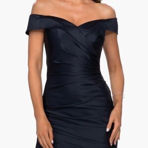 Off the shoulders satin evening dress.